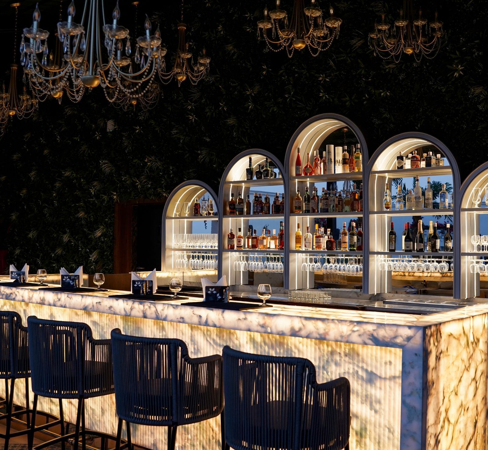 Corner view shot of the bar counter featuring an extensive collection of premium liquor for display at the Sky Roof at M2 Square by Monday Premium.