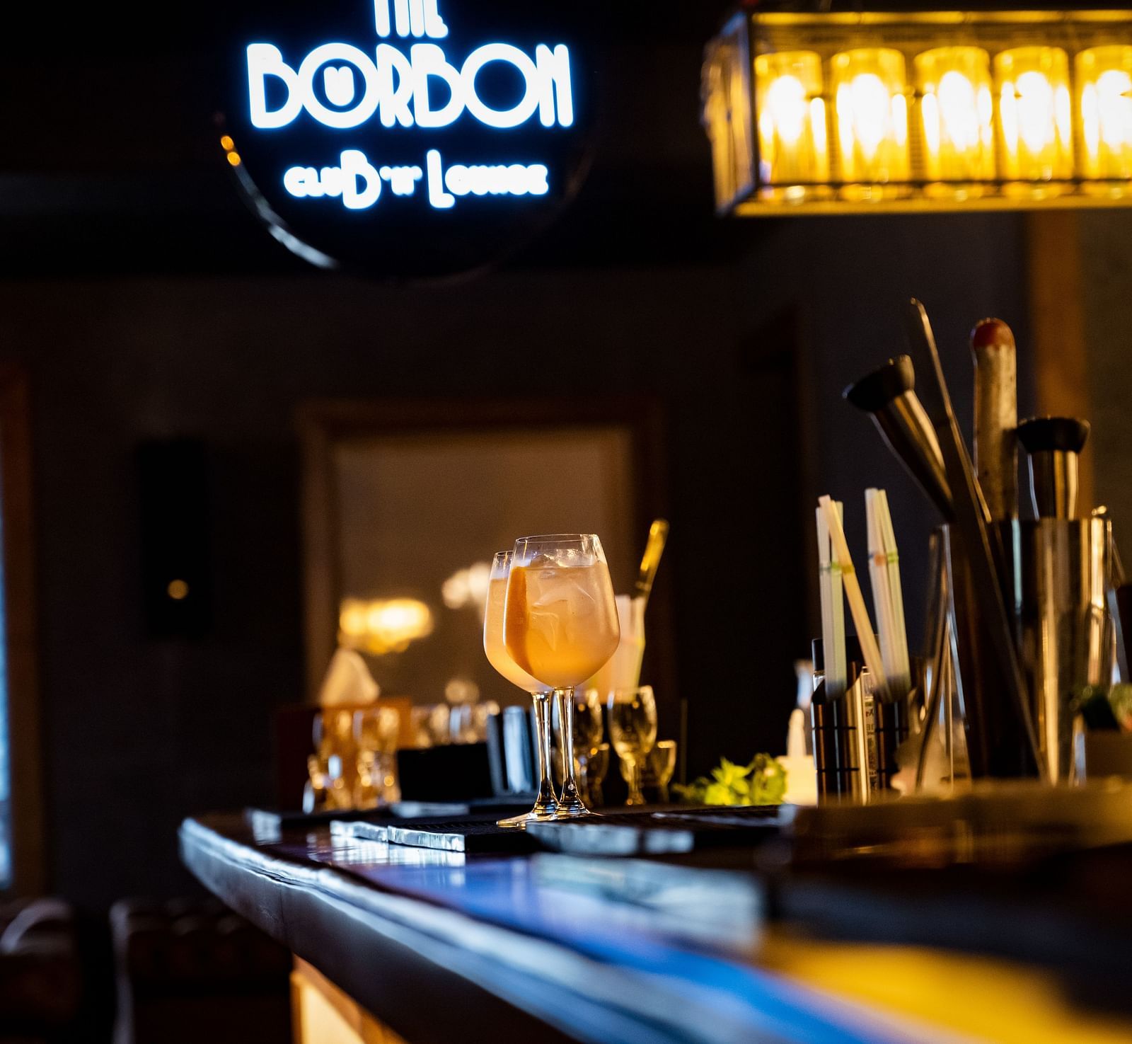 image of the bar counter top with various bar essentials at the bourbon club and lounge - The Tattva Boutique Resort