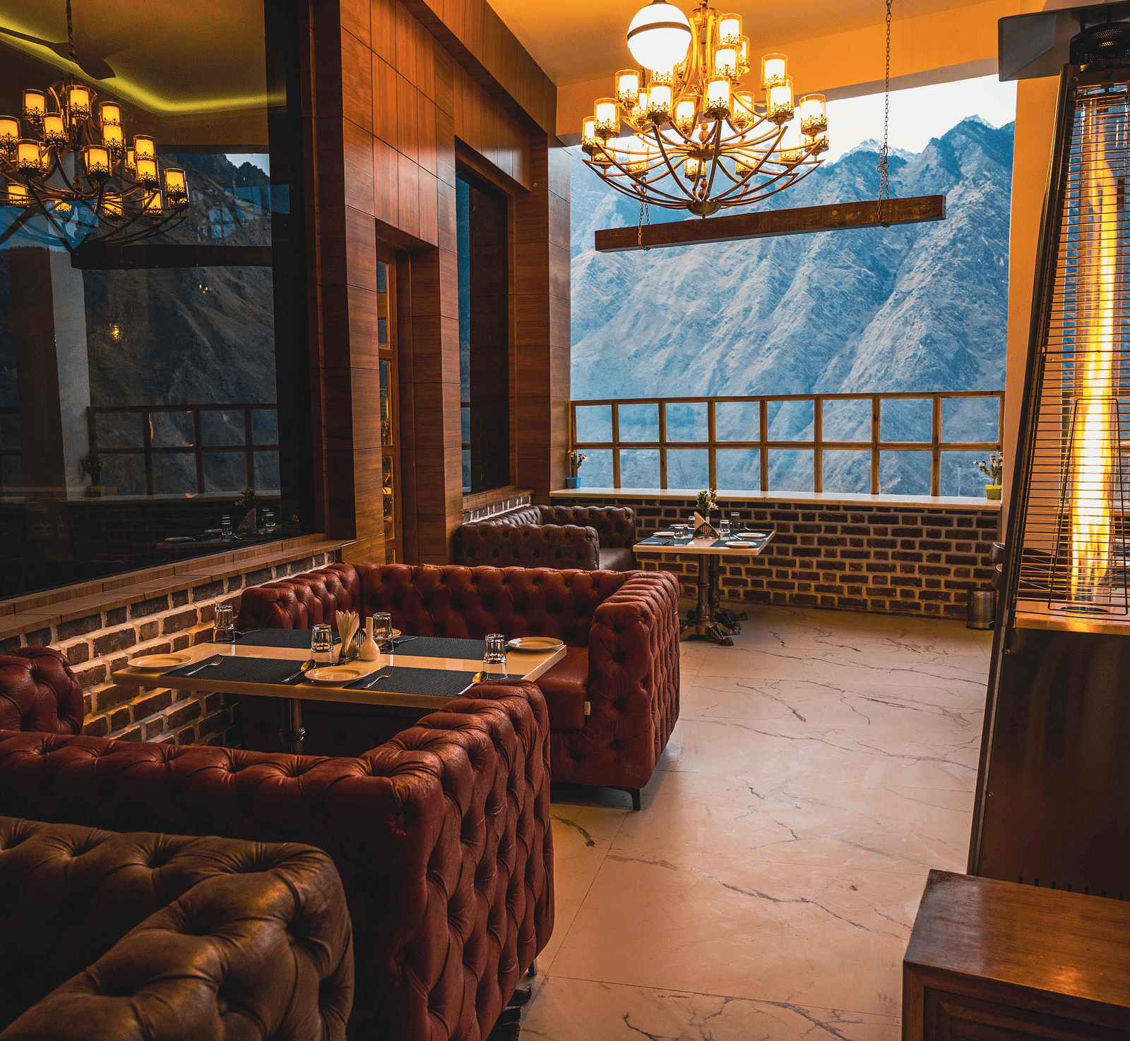 image of the alpenrose restaurant featuring an open mountain views during the day - the tattva boutique resort