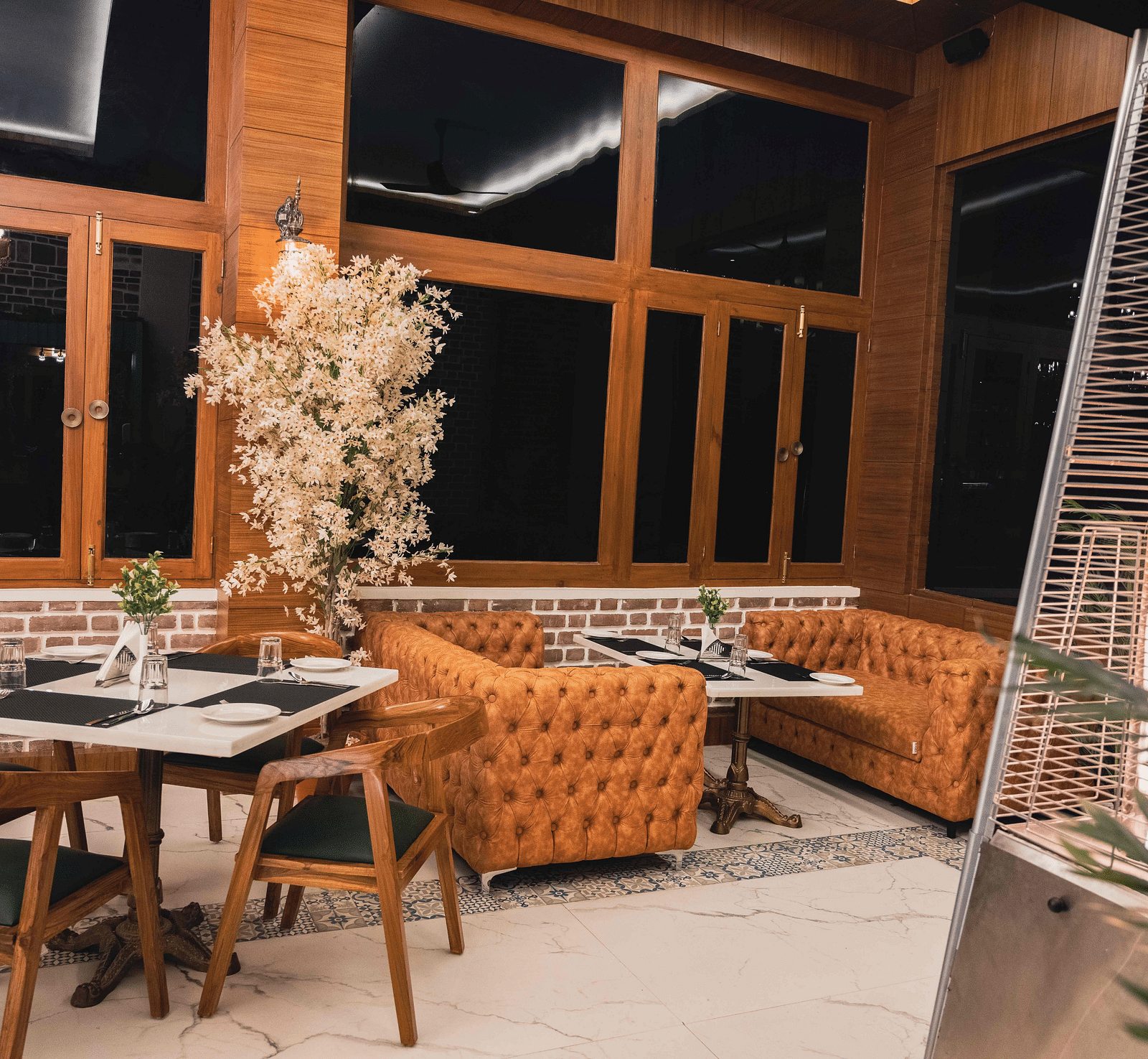 image of the indoor dining space of the alpenrose restaurant - the tattva boutique resort