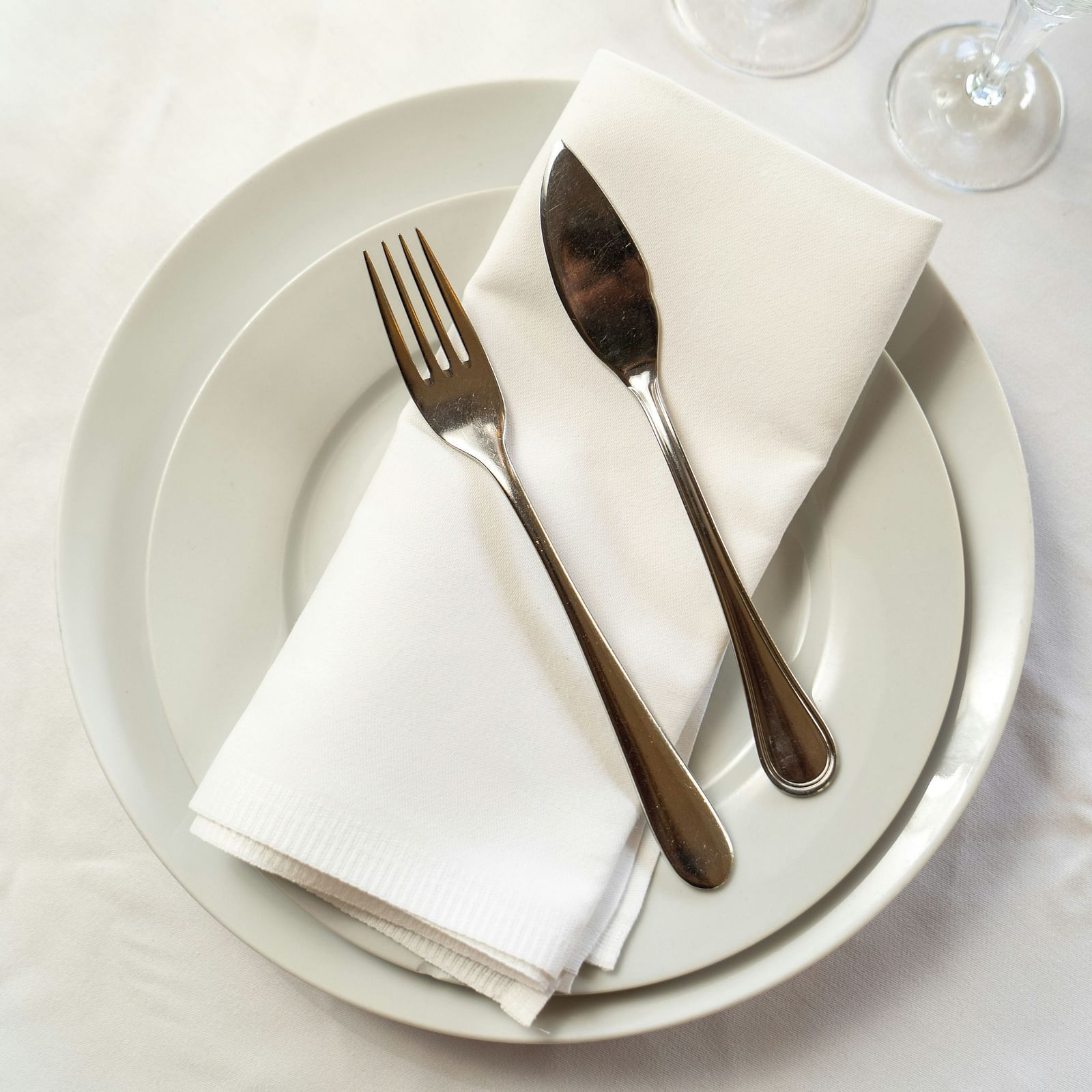 Cutlery served on a plate.