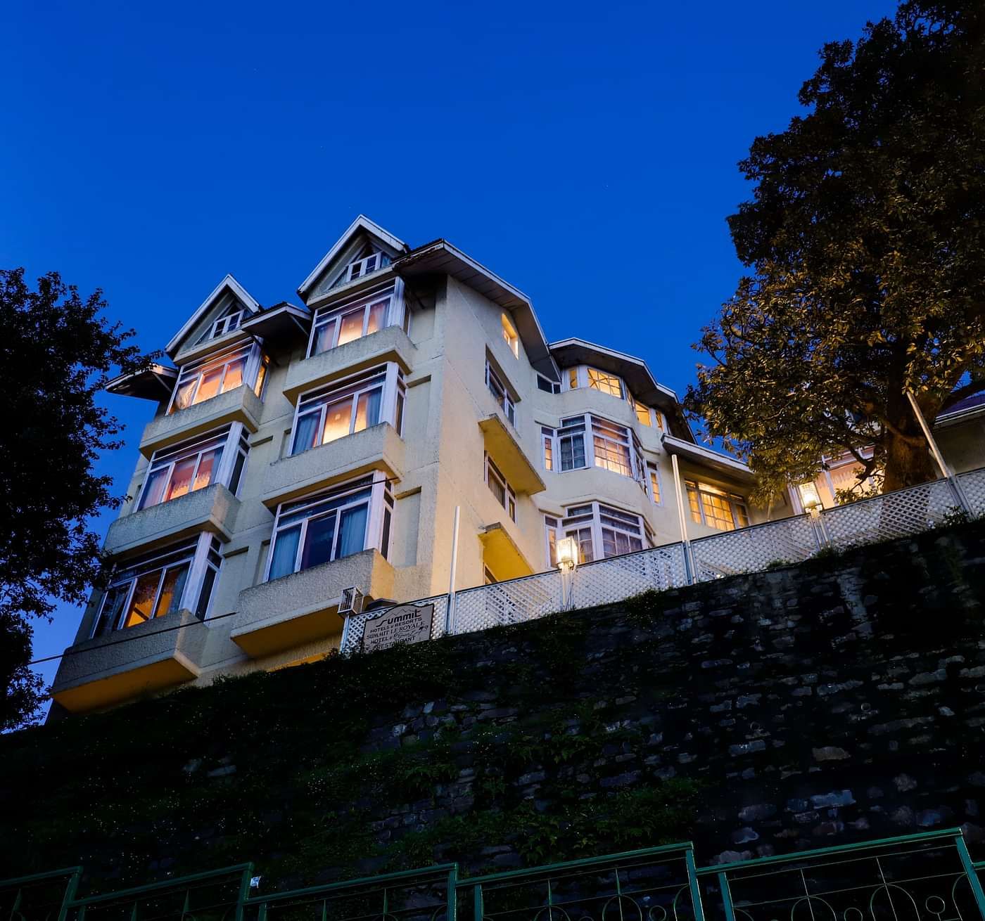 Nighttime exterior view of Summit Le Royale Hotel, Shimla