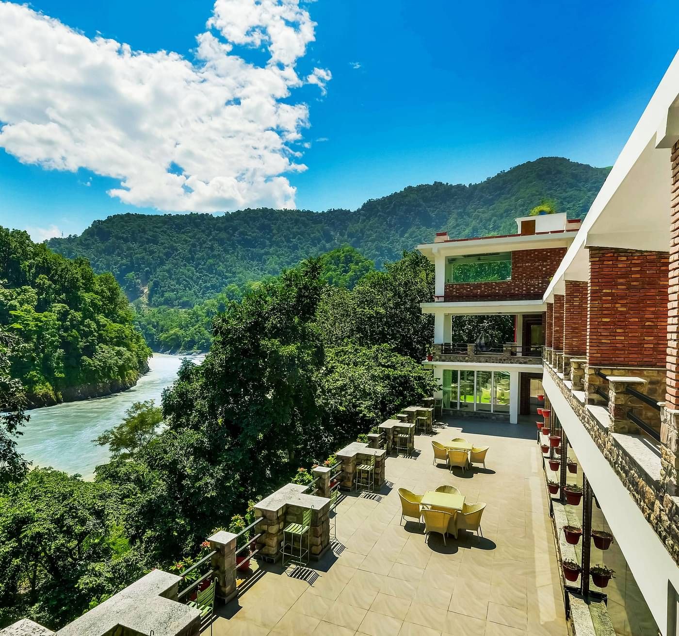 Facade of Summit By The Ganges Beach Resort & Spa, Rishikesh with view of the lush greenery at Summit By The Ganges Beach Resort & Spa, Rishikesh
