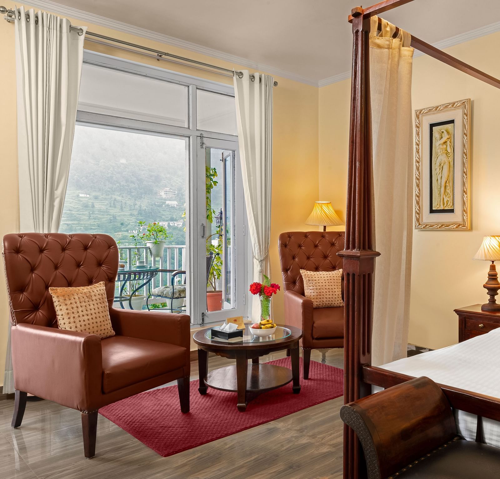 Room with comfortable chairs and bed at Superior Valley Facing  room Suvaasa, Ramgah