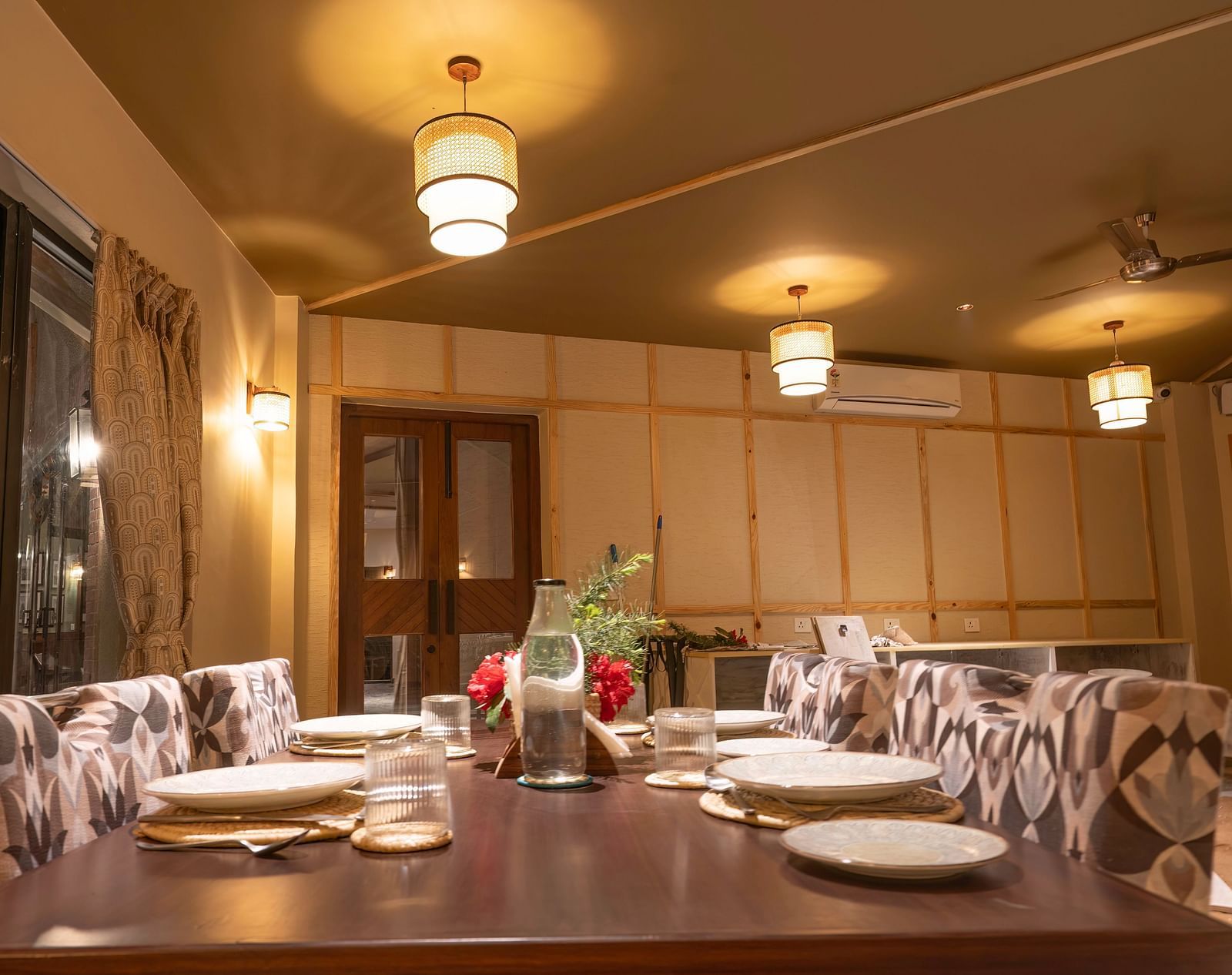 Well-set table in warm lighting at The Chamomile Estate.