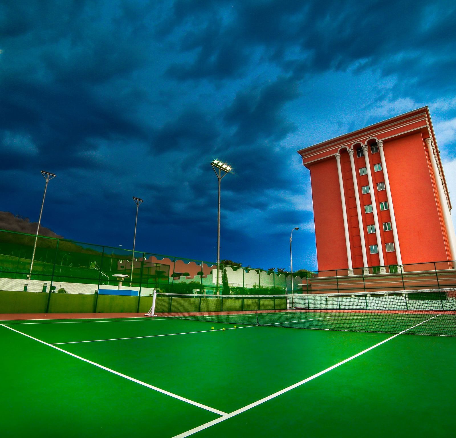 Tennis court facing the facade of Tara, Comfort Hotel in Hyderabad - Ramoji Film City.
