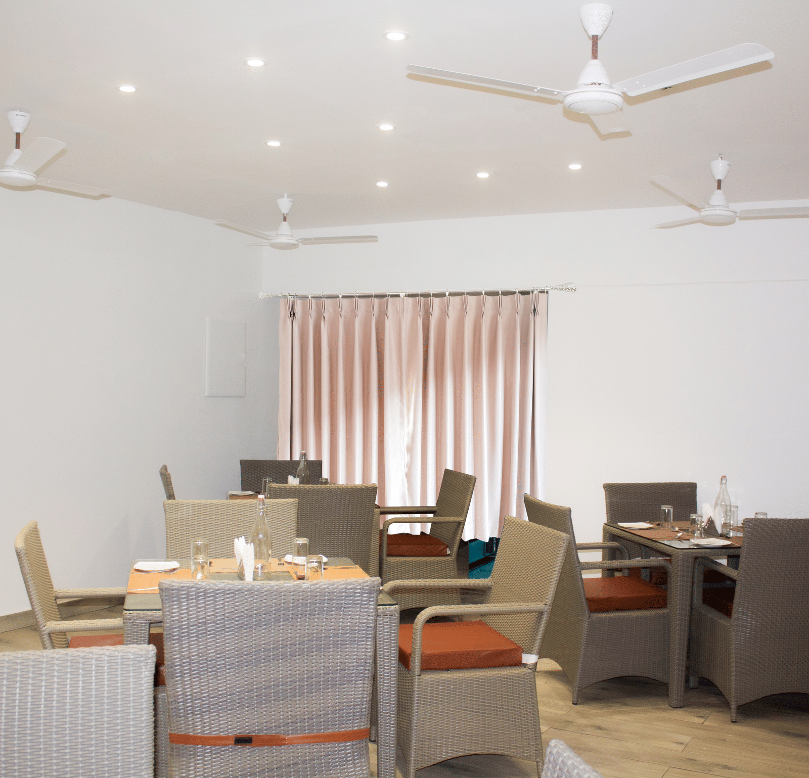 The Spice and Slice Restaurant with dining tables for up to 4 guests at WOW Naturefull Resorts, Yercaud.