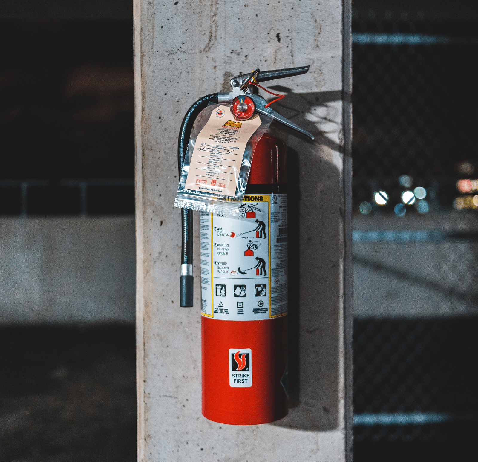 Fire Safety hanging on a pillar.