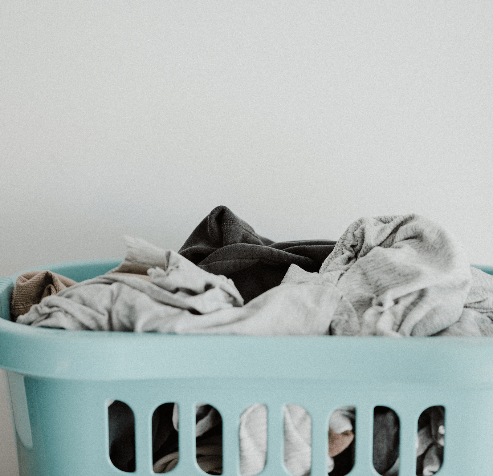 A picture of a basket full of clothes.