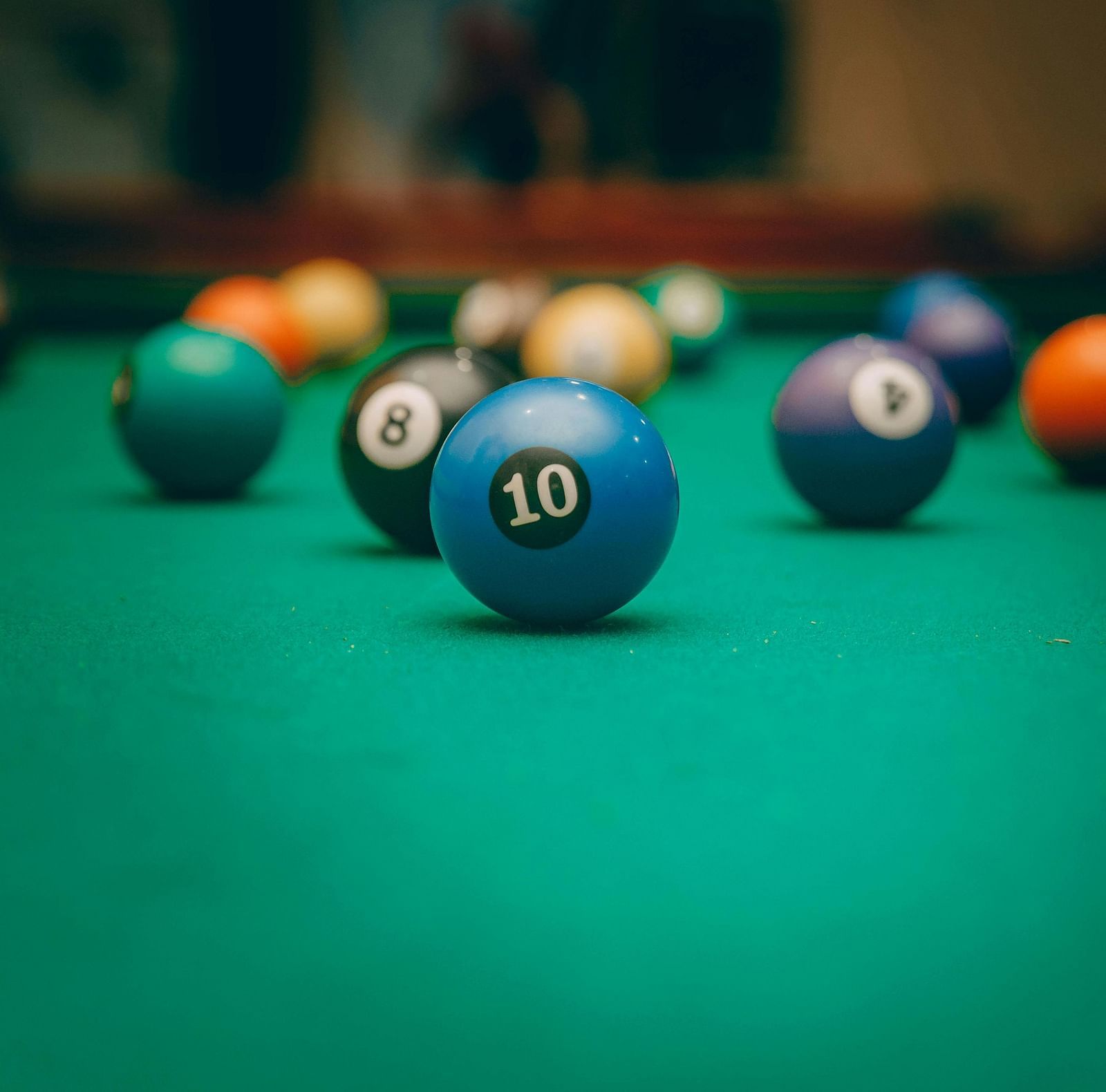 Billiard balls on a pool table.