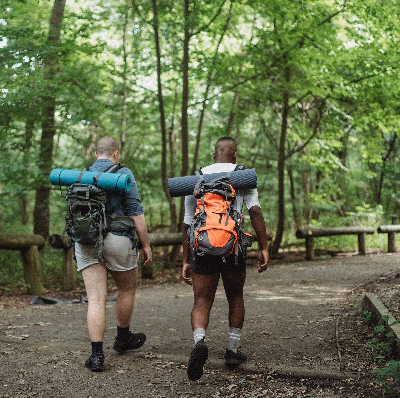 An image of two men trekking