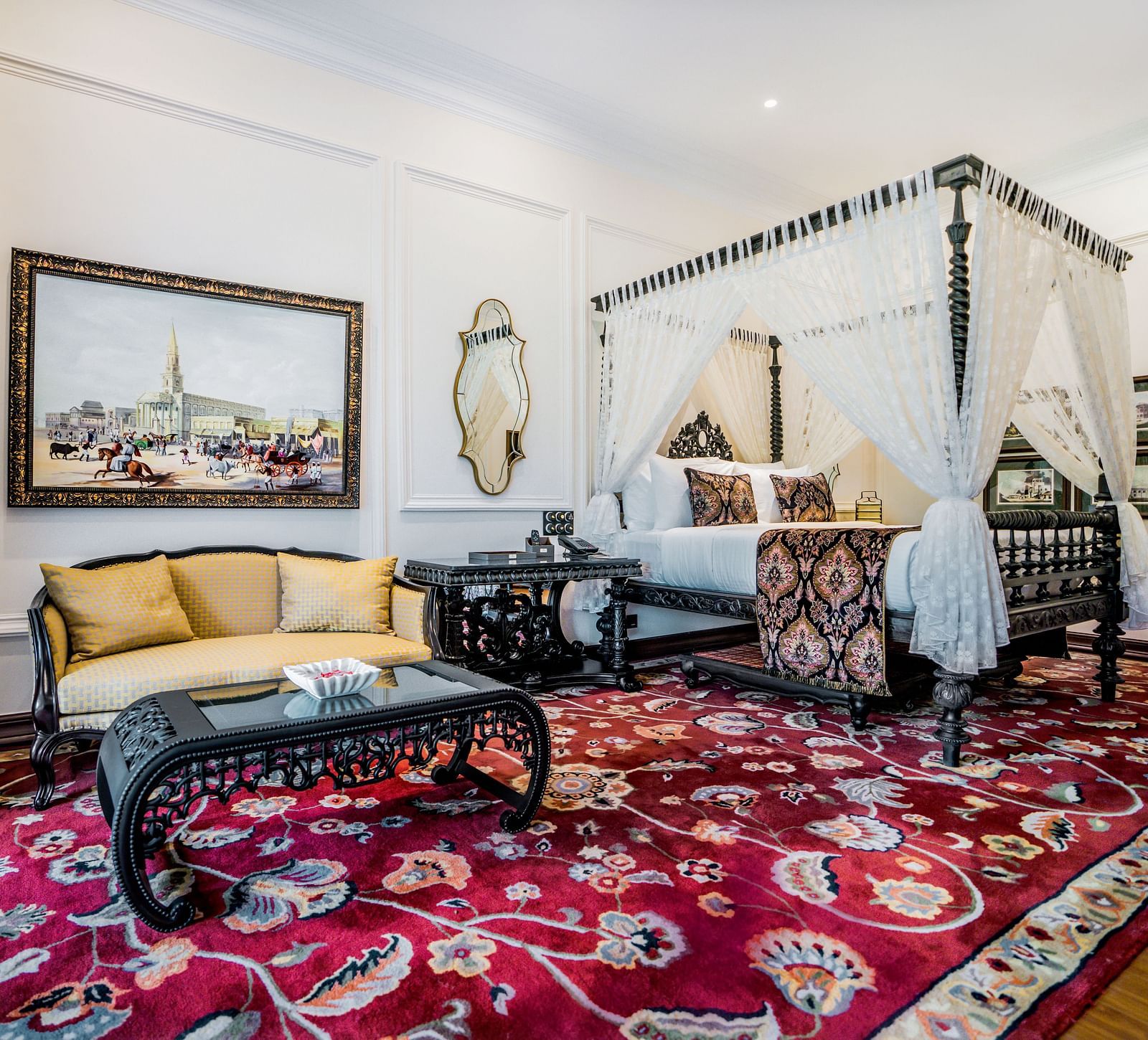 Heritage-style room with canopy bed and traditional Indian interiors.