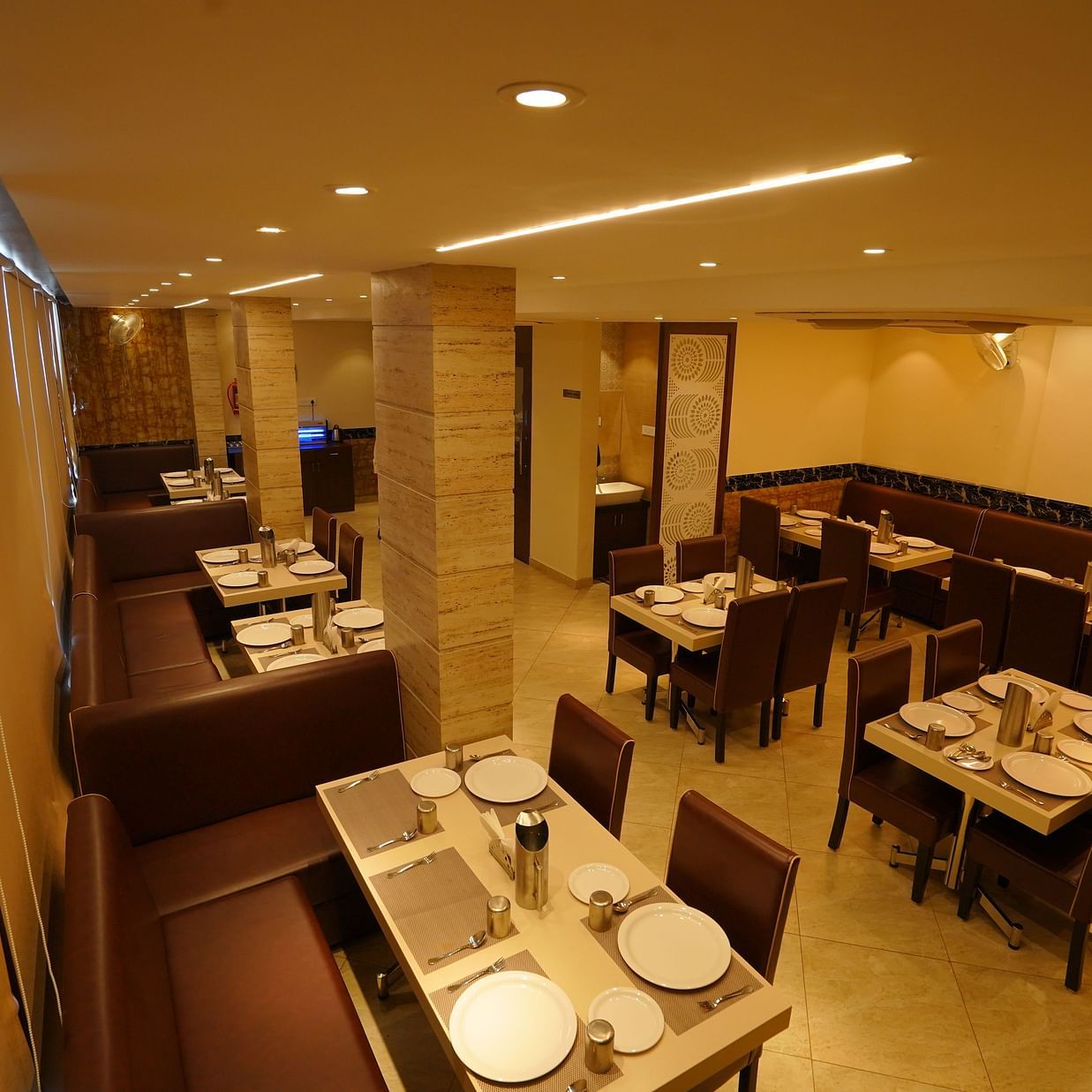 Seating arrangements of the restaurant at Springs Hotel Tirupati