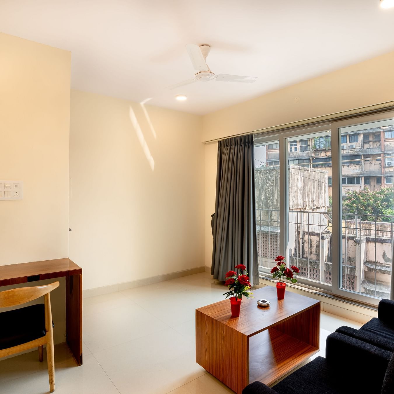 Home2 Suites & Service Apartments, Mumbai Airport - work desk and sofas in the living room of our suite room apartment in Mumbai