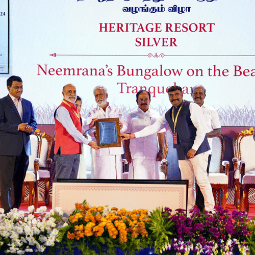 Award ceremony showcasing the presentation of the Silver Heritage Resort 