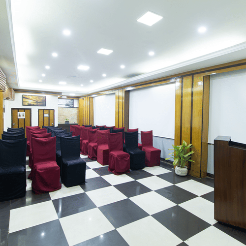 South Bank - Spacious waiting area with checkered flooring and plush red seating in a contemporary hotel - Polo Floatel Kolkata