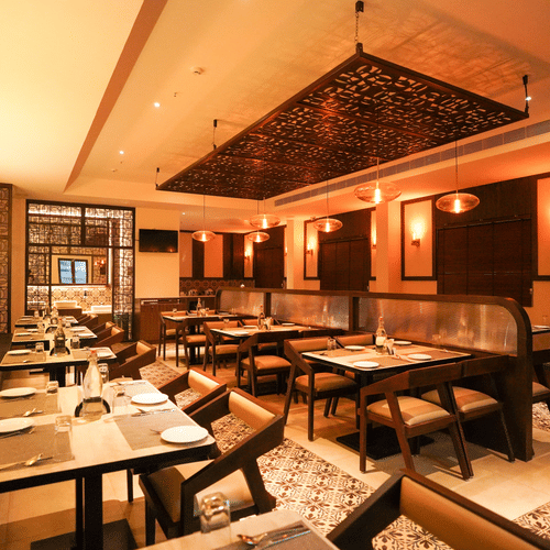 V Five Hotel - warmly lit up restaurant - Fifth sense