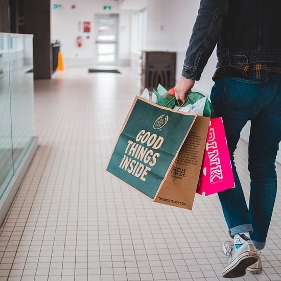 A person holding shopping bags