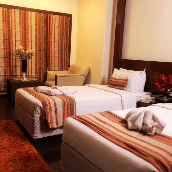 twin beds offered at one of the rooms - Polo Towers, Shillong