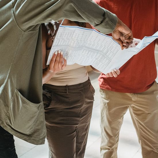 People reading a map