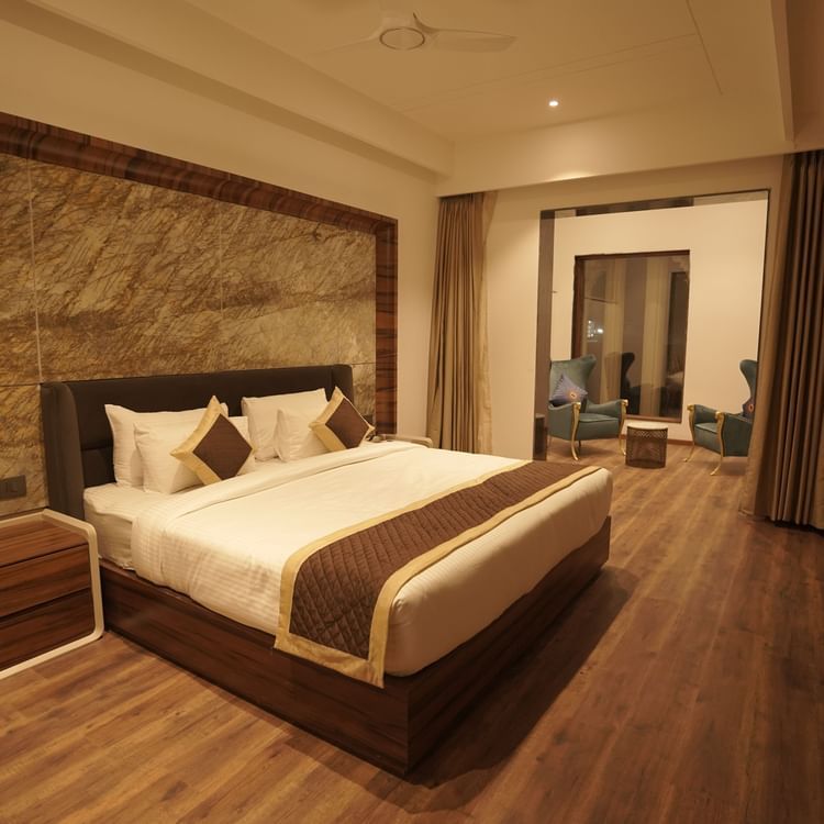 superior room with king size bed at Classic Sapphire by Ananta