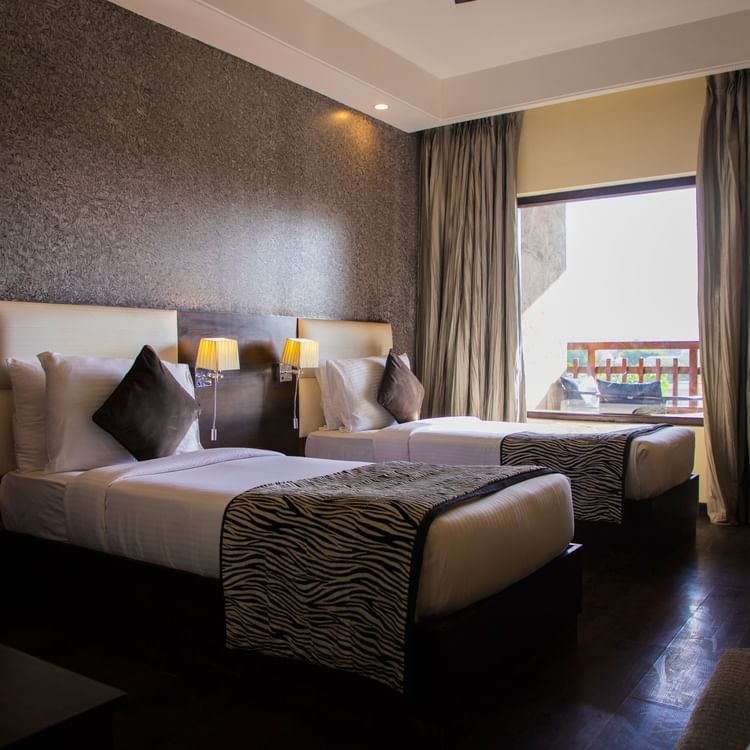 Twin room with plush beds