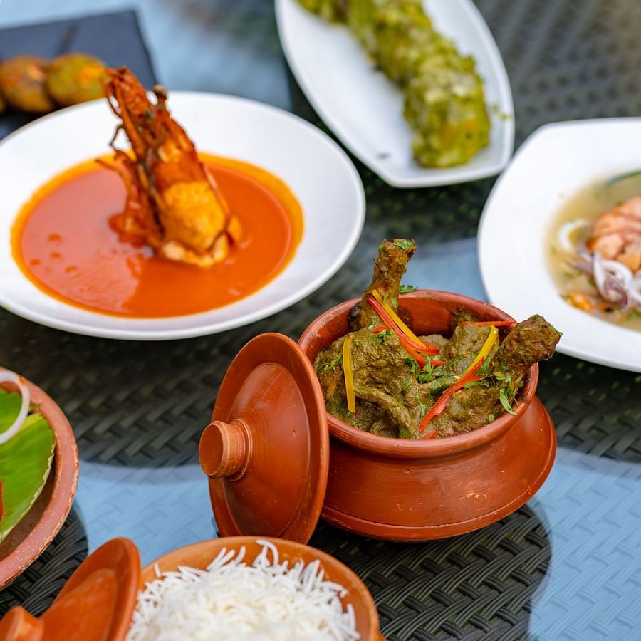An image of a dining table, adorned with an array of seafood dishes