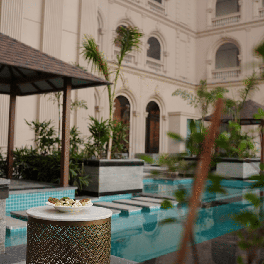 sitting area near the swimming pool at Classic Sapphire by Ananta