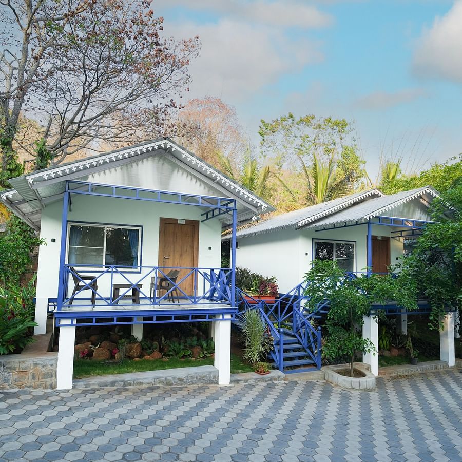 image of exterior of the property with two cottages side by side - MGM Whispering Wind