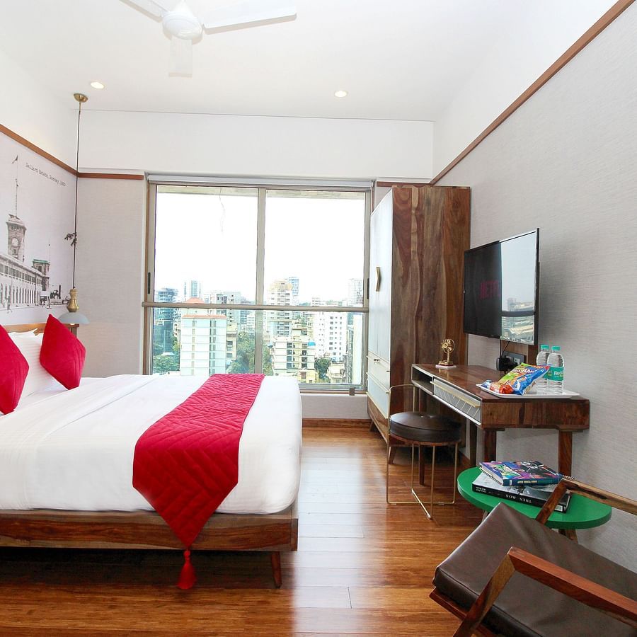 room with cushy king size bed and classy interiors at theory9 khar