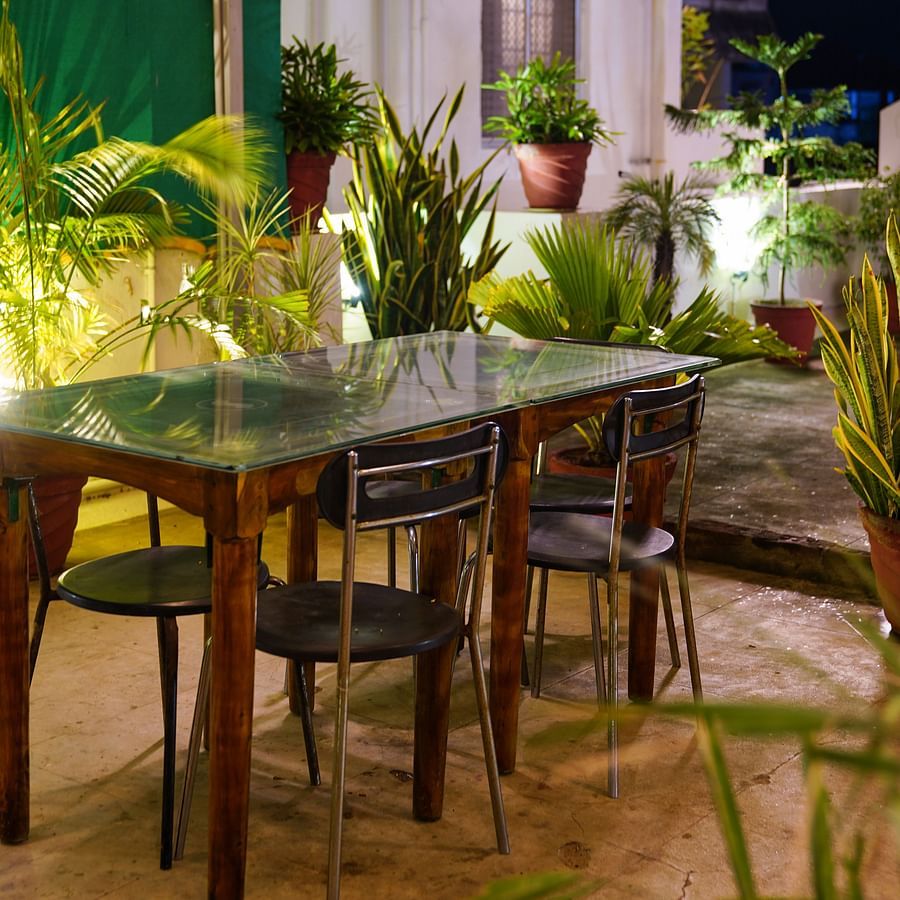 a table at the rooftop dining area of La Paradise Residency
