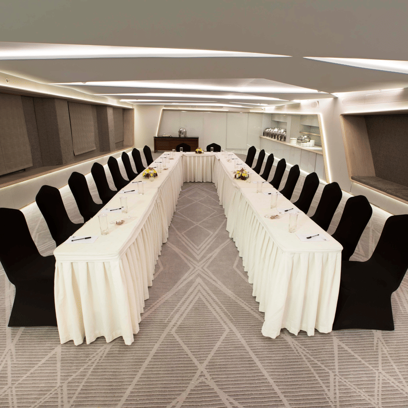 Contemporary boardroom setup with conference seating and presentation facilities for corporate meetings and workshops | Hablis Hotel Chennai