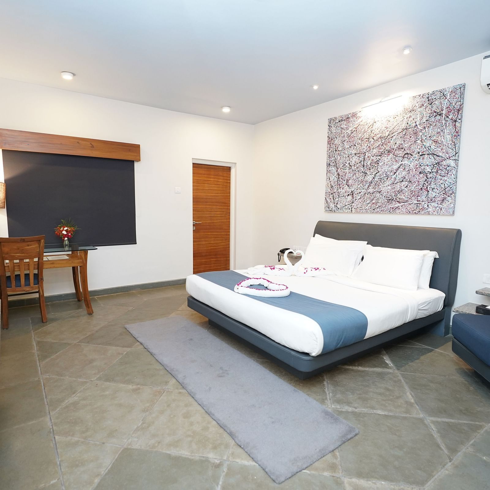 An image of a bedroom with king size bed, a TV, and other essentials - Argo By Trance, Goa