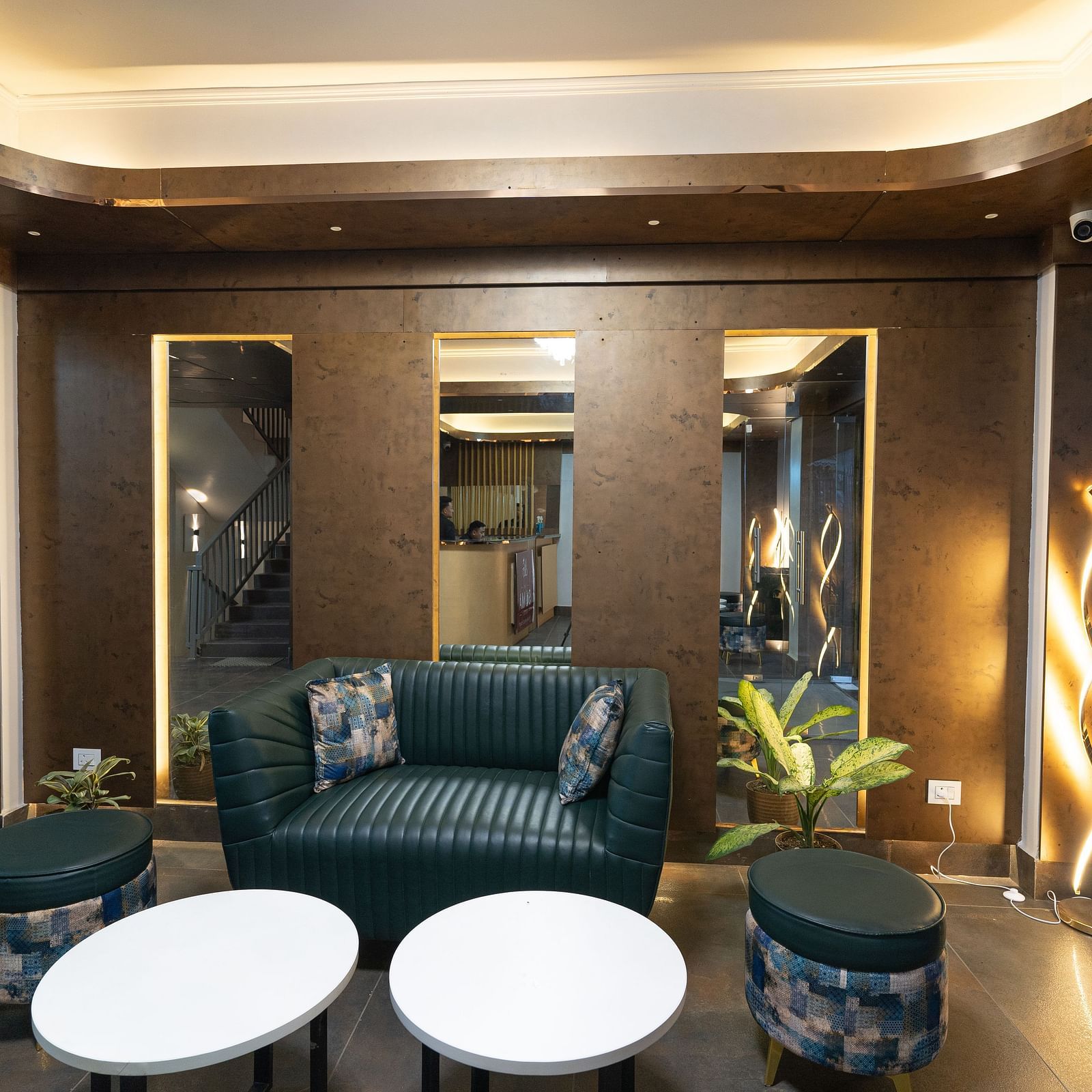 Lobby area with sofas and table at Soma Hotel by Avianna Group