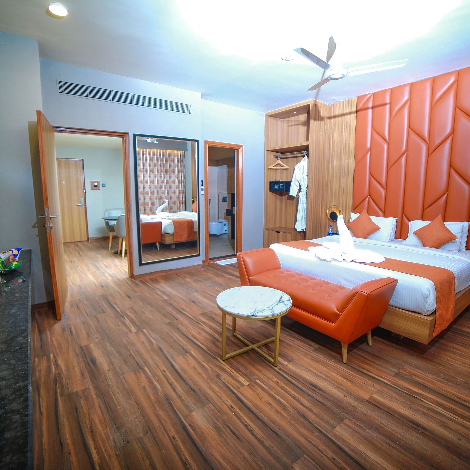 Wide view of the double bed in the Grand Balcony Room at Grand Palace, Yercaud