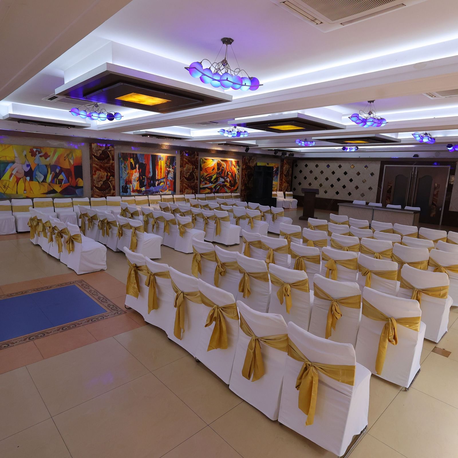 Image of Amar Convention Centre hall in Hotel Amar with classroom seating arrangement of chairs