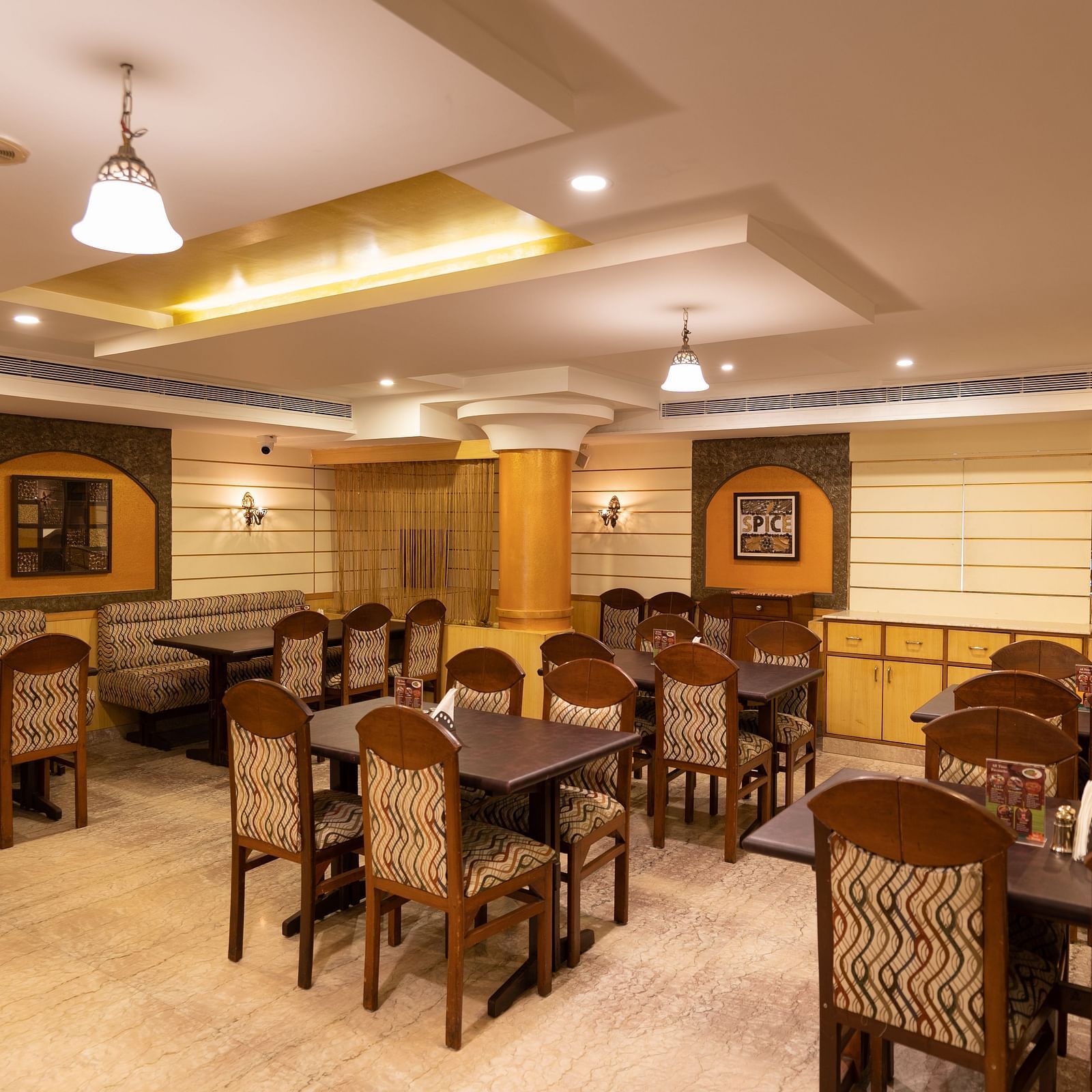 Seating arrangements inside the restaurant - Hotel Pai Comforts, JP Nagar
