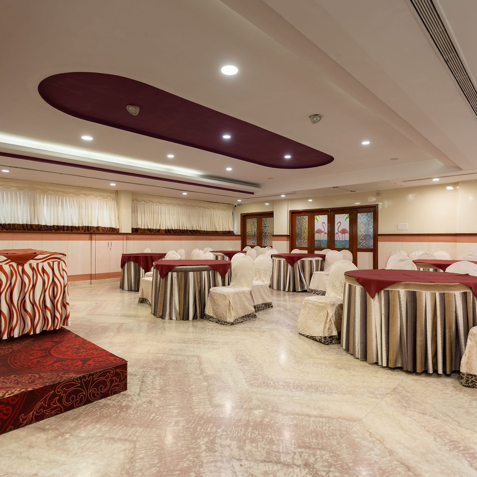 Seating arrangements inside the banquet hall - Hotel Pai Comforts, JP Nagar