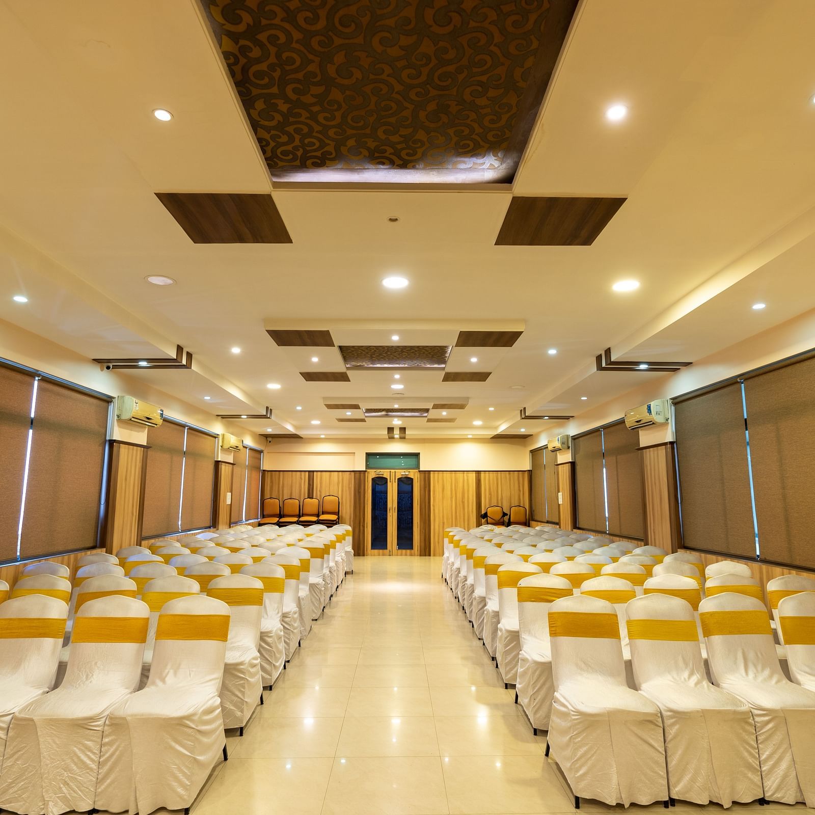 Seating arrangements inside a banquet hall - Hotel Pai Vista, KR Road