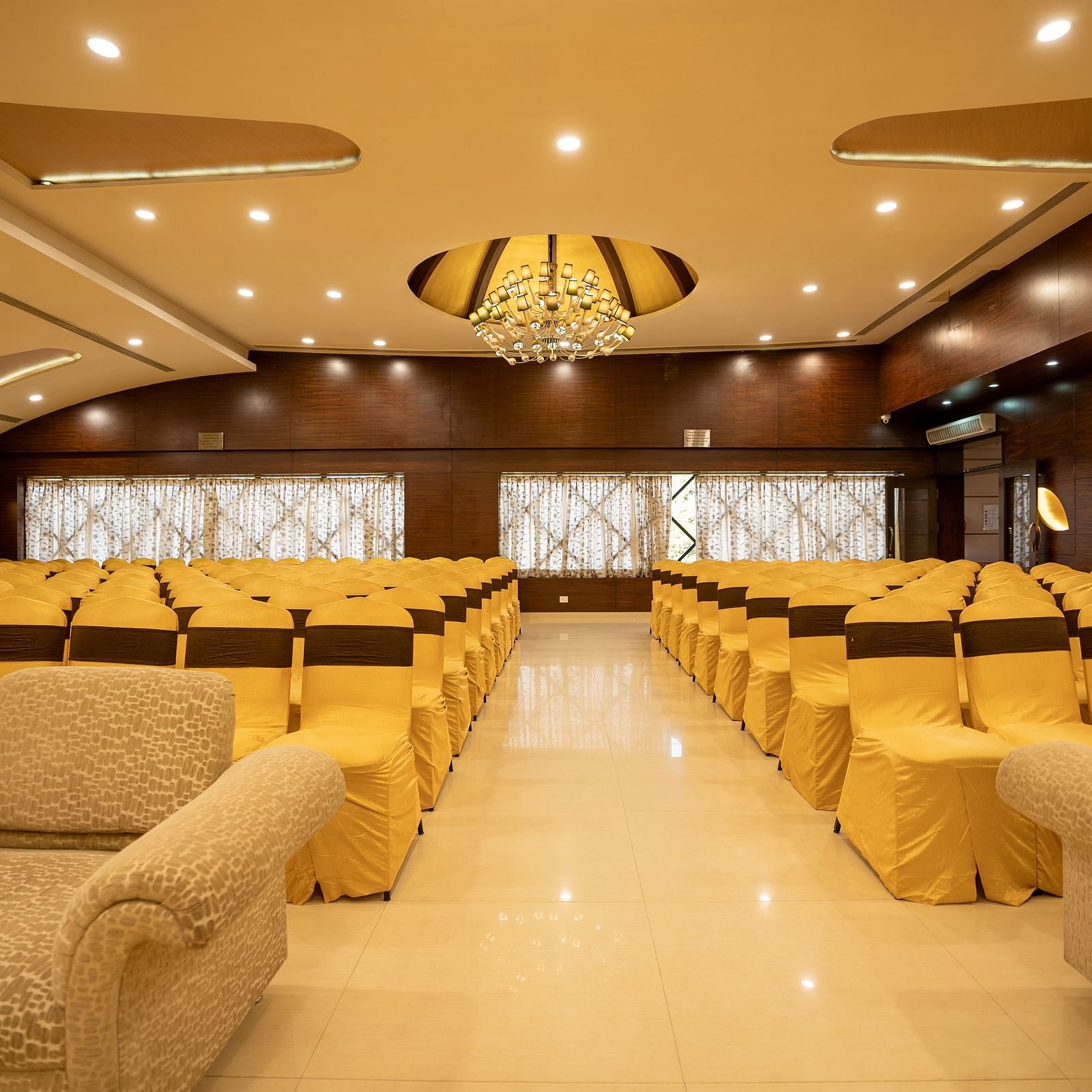 Seating arrangements inside a banquet hall - Hotel Pai Vista, KR Road