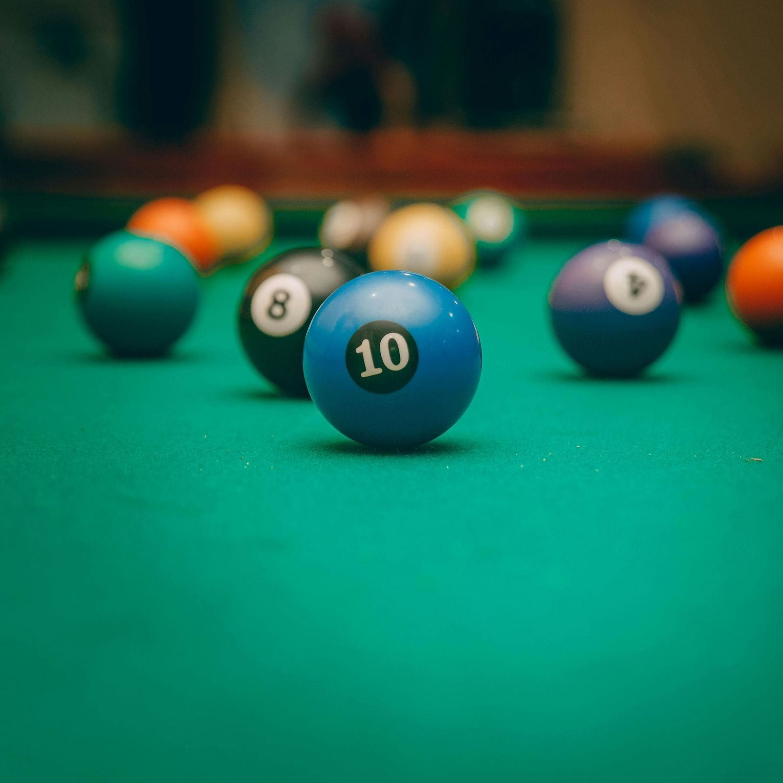 Billiard balls on a pool table.