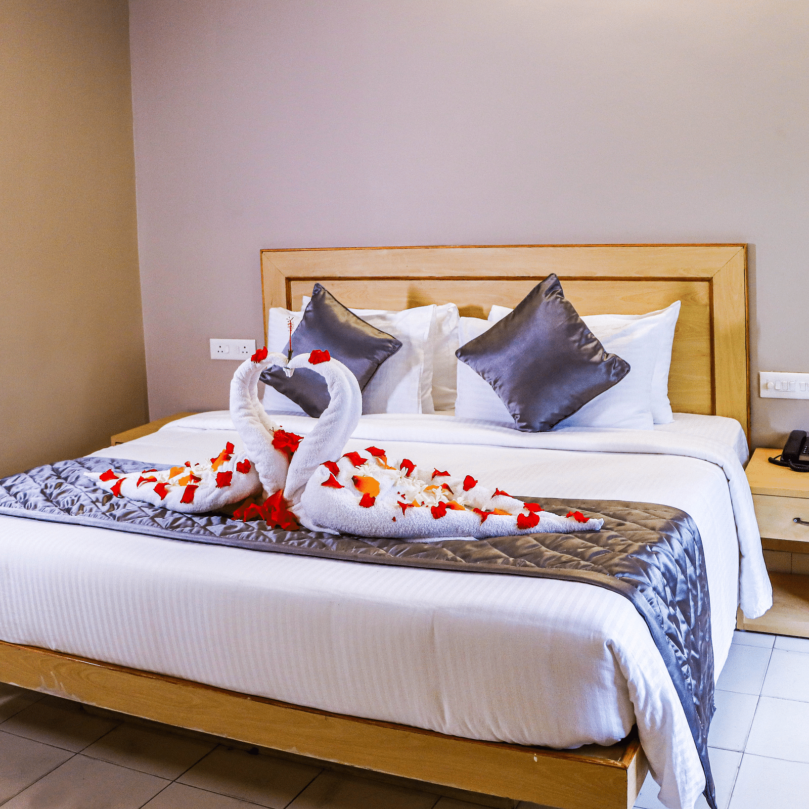 view of king size bed of a Queen Room at at Hotel Vinayaga, Tiruppur