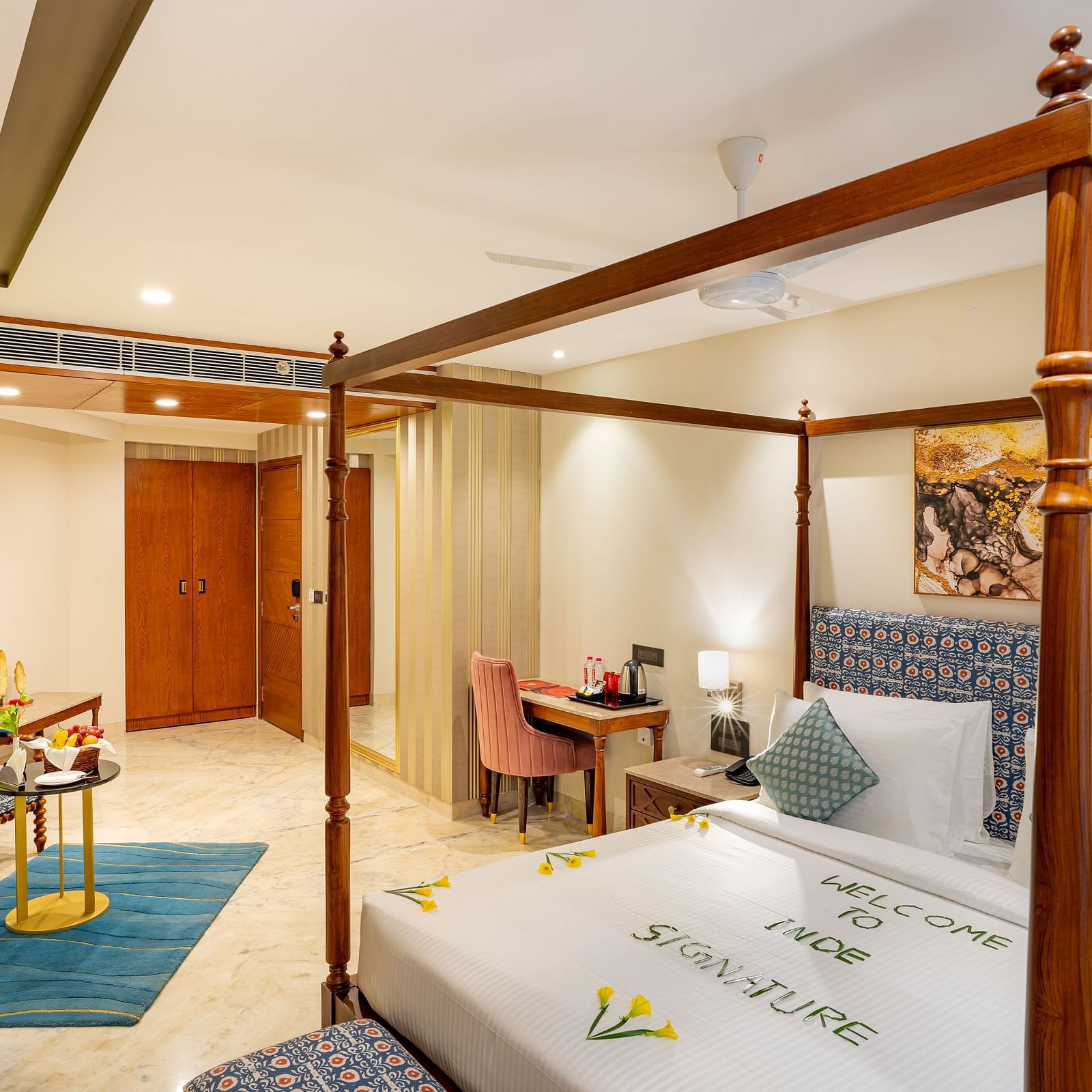 Spacious Suite with double bed, comfortable seating at Inde Signature Jaipur