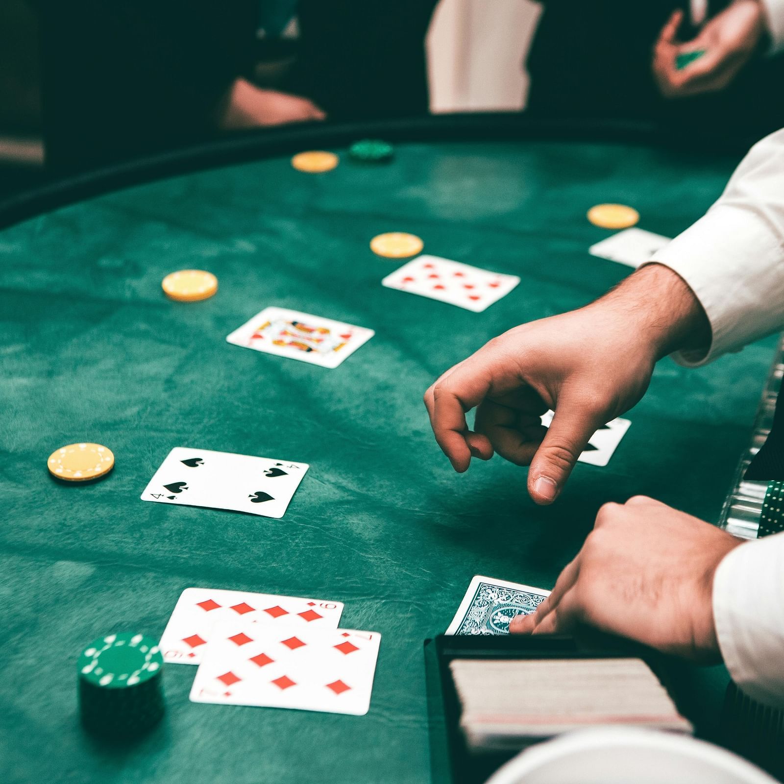 People playing poker in a casino.