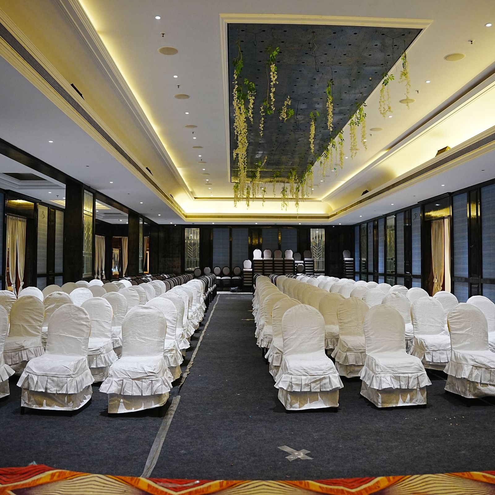 a duplicate of the banquet hall with theatre style seating arrangement at Lords Hrim Akshara Resort Basar