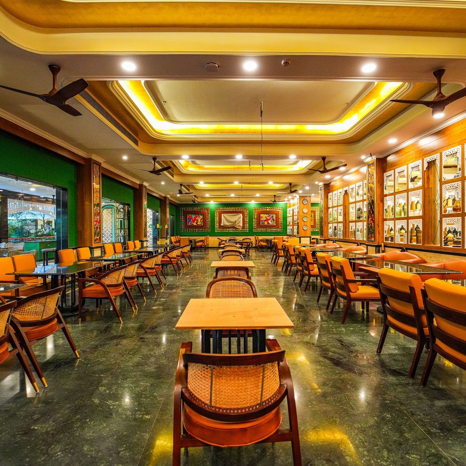  Seating and interior of the  Dining Room at MAYFAIR Oasis Resort & Convention