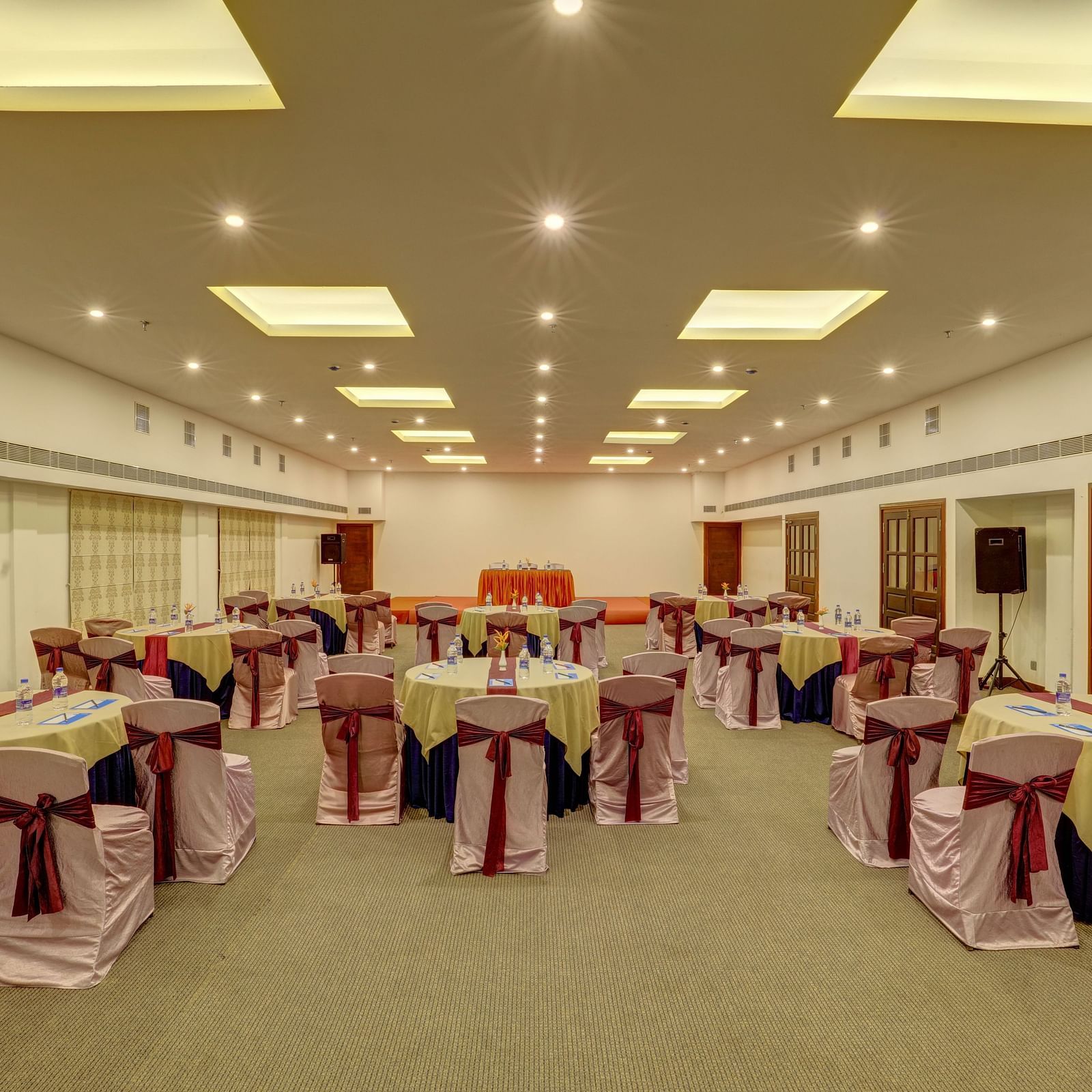 an overview of a Banquet hall in a cluster style arrangement - Rhythm Kumarakom.