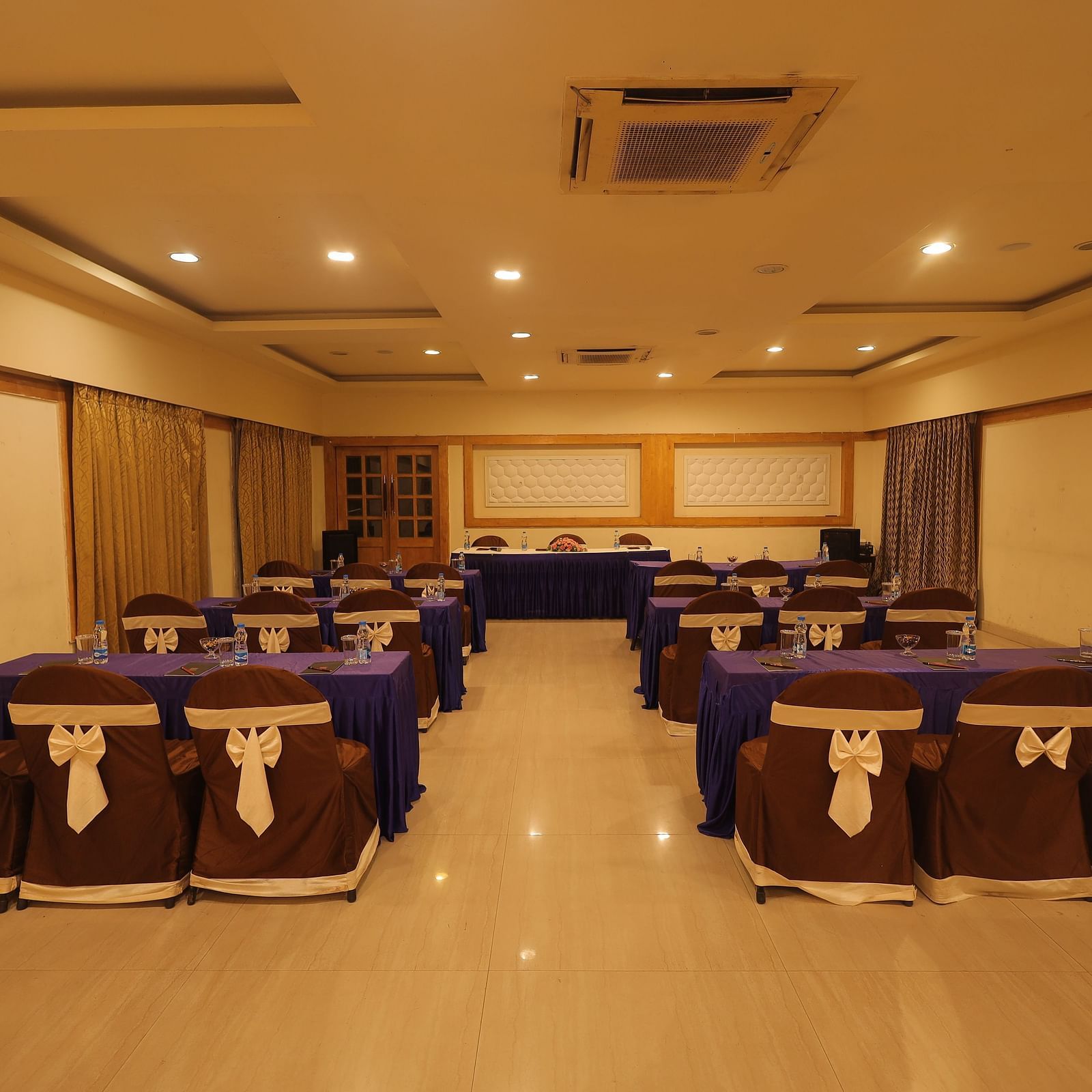 A banquet hall with seating arrangement