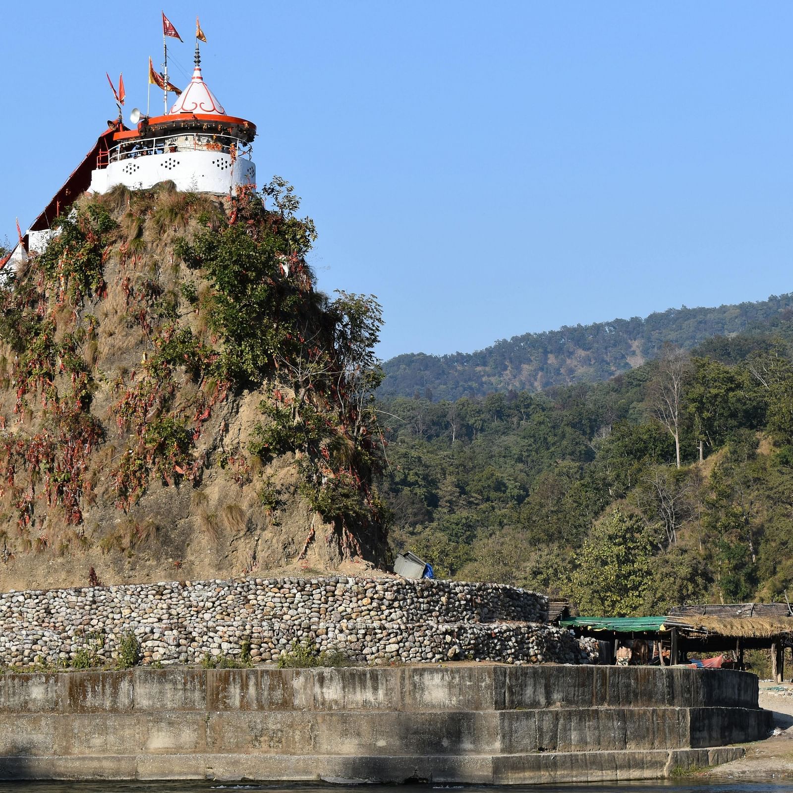 Facade view of Garjiya Devi Temple, a Hindu shrine atop a rock in the Kosi River.