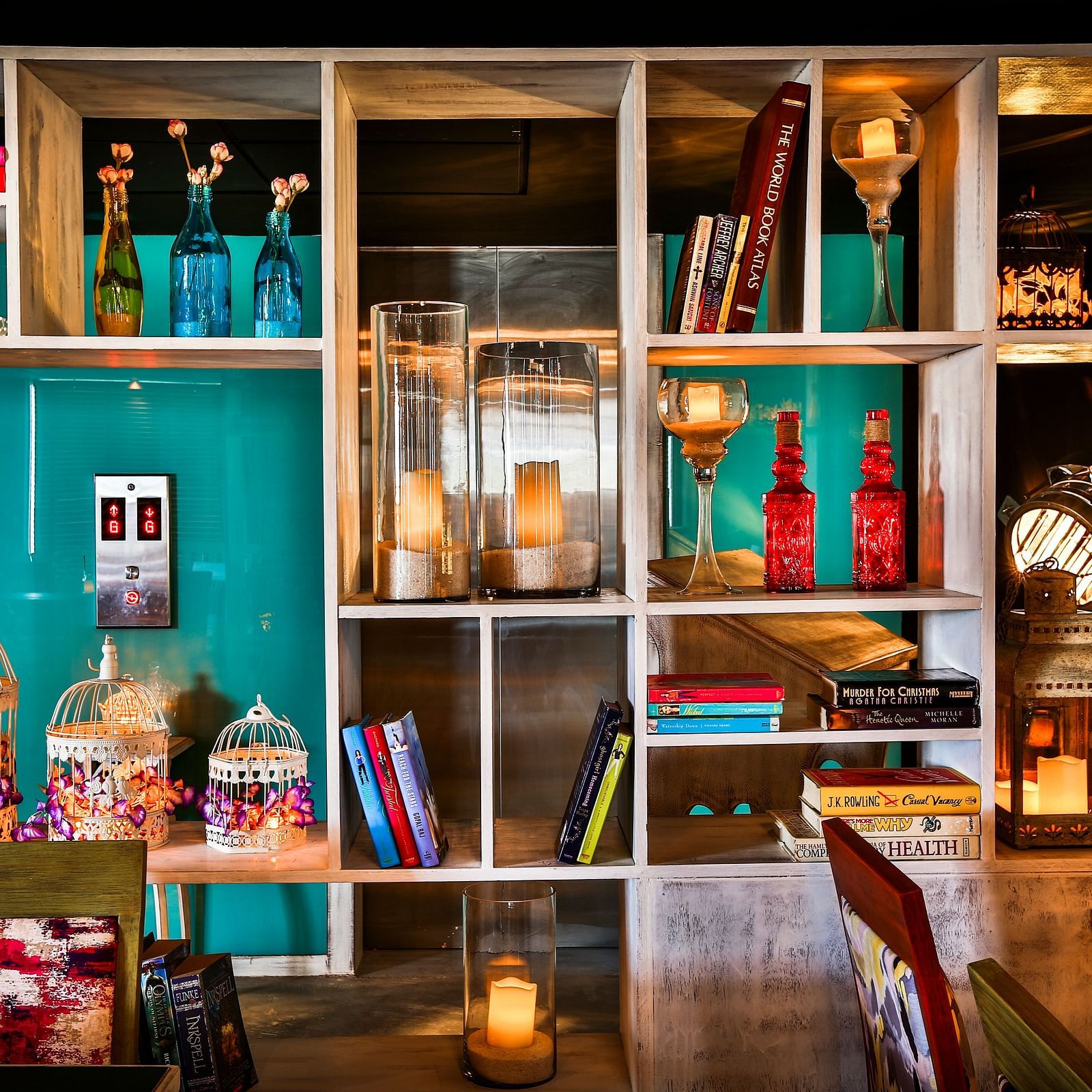 A shelf with various decorative pieces placed on it at T24 Residency, Andheri East, Mumbai